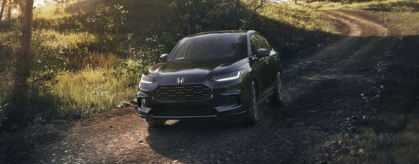 Black 2027 Honda HR-V EX-L driving on a trail